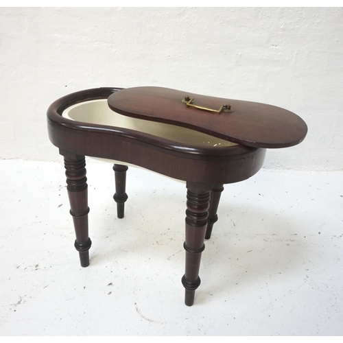 535 - LATE VICTORIAN MAHOGANY FRAMED BIDET
the shaped top with brass handled lift-off cover, Wedgwood porc... 