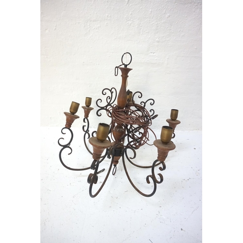 553 - SIX BRANCH CEILING LIGHT
with a suspension hook and turned wood column with six scroll arms, 65cm hi... 