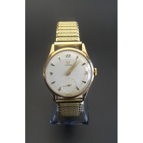 146 - VINTAGE GENTLEMAN'S 'OMEGA' NINE CARAT GOLD CASED WRISTWATCH
with subsidiary dial and rolled gold ex... 