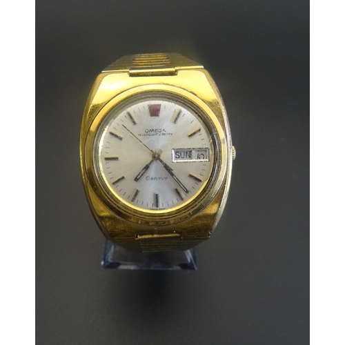 152 - 1970s GENTLEMAN'S 'OMEGA MEGAQUARTZ 32 KHZ' WRISTWATCH
with date aperture and link bracelet strap