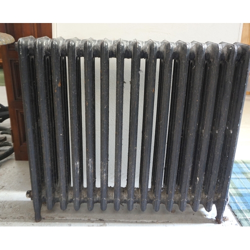 543 - EDWARDIAN CAST IRON RADIATOR
comprising fifteen sections, standing on squat supports, 78cm x 90cm