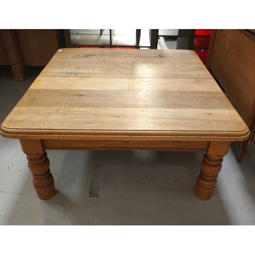 518 - LIGHT OAK TABLE
with a rectangular moulded top standing on bulbous supports cut down from original h... 