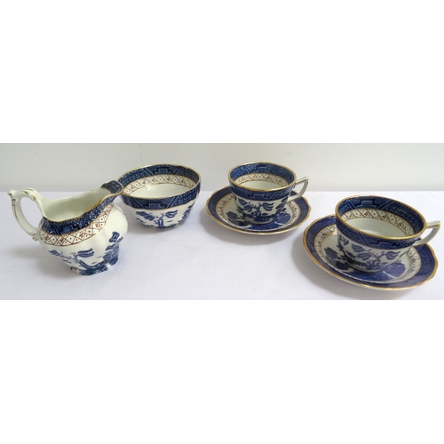 211 - BOOTHS REAL OLD WILLOW PATTERN TEA SERVICE
comprising seven cups, eight saucers, six side plates, mi... 