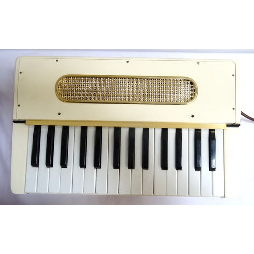 260 - CHILD'S HOHNER ORGANETTA 3
electric piano/keyboard in white plastic with removable music stand and p... 