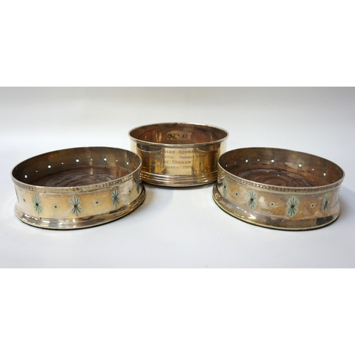 189 - PAIR OF ELIZABETH II SILVER BOTTLE COASTERS
with mahogany bases and chased and pierced decoration, L... 