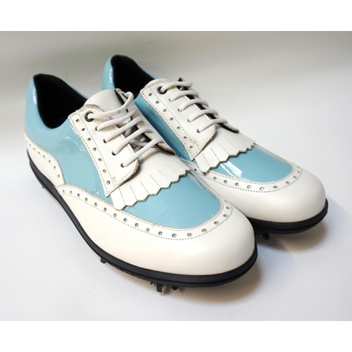 323 - PAIR OF BRAND NEW LADIES BALLY GOLF SHOES
in two tone white leather and pale blue vinyl, UK size 6.5... 