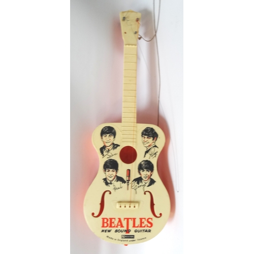 295 - EARLY 1960s 'BEATLES NEW SOUND GUITAR'
Selcol Products Limited, Made in England under licence, 58.7c... 