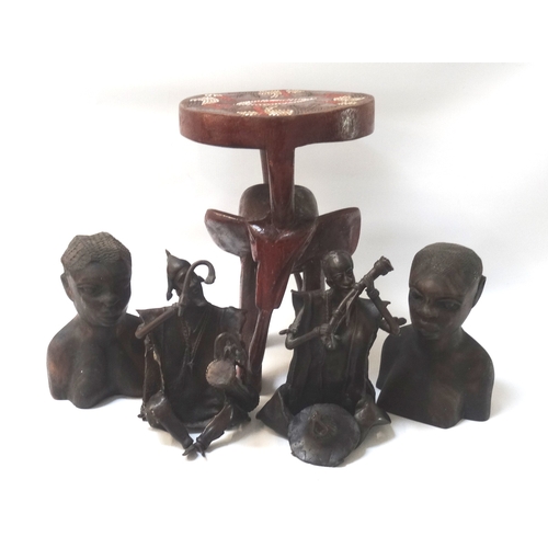 266 - AFRICAN INTREST
two rustic design metal musicians, pair of carved hardwood busts of women and a smal... 