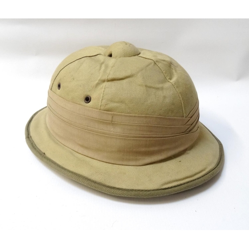 318 - PITH HELMET
with liner and chinstrap