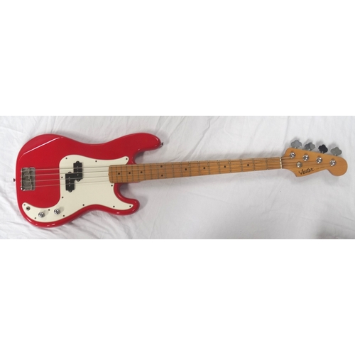 305 - VESTER ELECTRIC BASS GUITAR
with a red and white body with volume and tone dials, the back marked 93... 