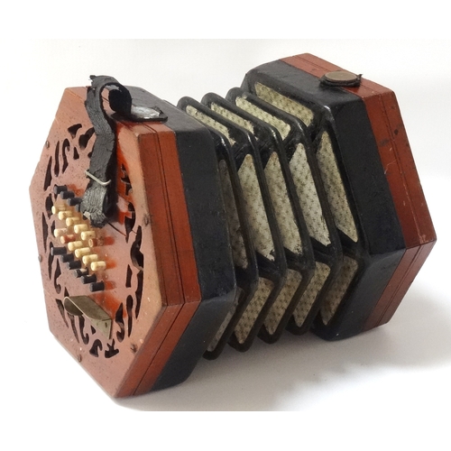 312 - LACHENAL & CO. CONCERTINA
circa 1900 with rosewood fret carved hexagonal ends, each with twenty four... 