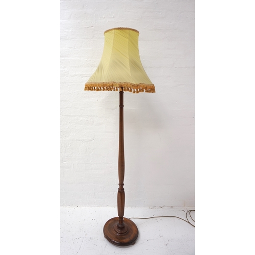 505 - WALNUT STANDARD LAMP
raised on a circular base with a shaped and turned column, with a shaped and pl... 