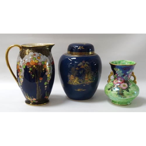 226 - CROWN DEVON GINGER JAR
with a blue ground and Japanese garden decoration, 23.5cm high; a Crown Devon... 