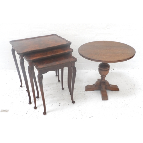 509 - NEST OF THREE WALNUT TABLES
with quarter veneer tops and wavy rims, standing on cabriole supports, 5... 