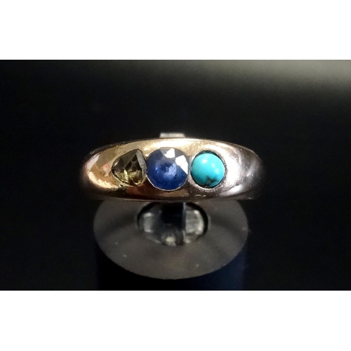 109 - TURQUOISE, DIAMOND AND SAPPHIRE THREE STONE RING
on gold shank with indistinct marks, ring size P-Q ... 