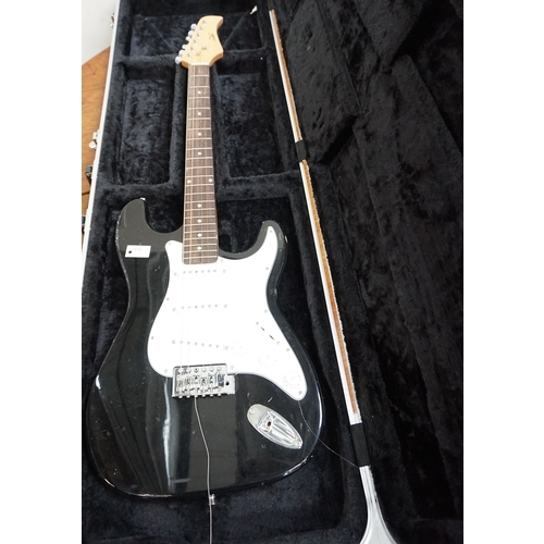 308 - CB SKY ELECTRIC GUITAR
with a black and white body with volume and tone dials, together with a Thoma... 