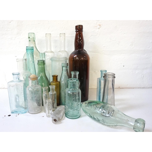 229 - SELECTION OF VINTAGE GLASS BOTTLES
including a William Hill of Glasgow with a 'Table Spoon' guide im... 