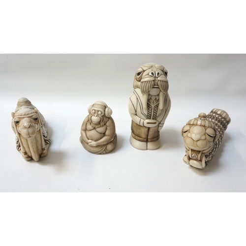 230 - FOUR RESIN COMICAL ANIMALS AND SIMILAR
comprising a Walrus wearing a tail coat, 15.5cm high; a kneel... 