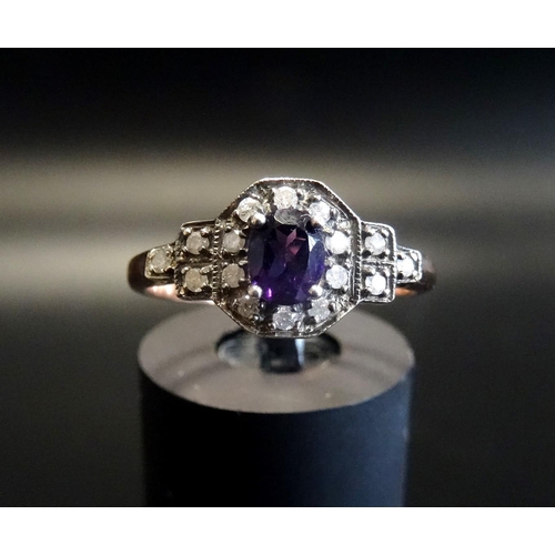 137 - AMETHYST AND DIAMOND CLUSTER RING
the central oval cut amethyst in diamond surround, on unmarked ros... 