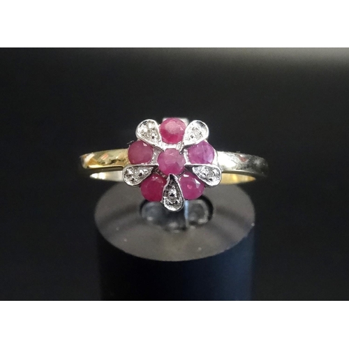 146 - RUBY AND DIAMOND CLUSTER RING
on nine carat gold shank, ring size O-P - RETURNED