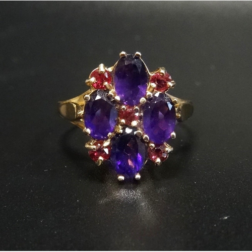 148 - RUBY AND AMETHYST DRESS RING
the four oval amethysts separated by small rubies, on nine carat gold s... 