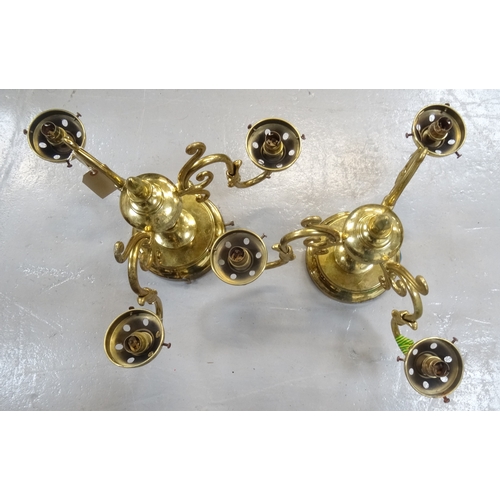 531 - PAIR OF GILT BRASS CEILING LIGHTS
each with three scroll arms and opaque circular glass shades - RE-... 