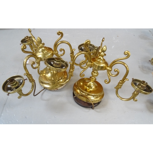 534 - PAIR OF GILT BRASS CEILING LIGHTS
each with three scroll arms, lacking shades