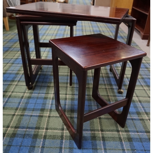 542 - RERO 1960s 'A.H.McIntosh, Kirkcaldy' FOLD-OVER TWIST TOP TEAK TABLE
with two fitted tables to unders... 