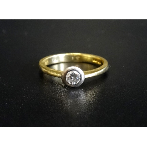 134 - DIAMOND SOLITAIRE RING
the bezel set diamond approximately 0.15cts, on eighteen carat gold shank, ri... 