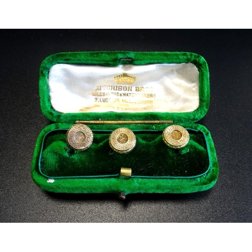 82 - EDWARDIAN GENTLEMAN'S UNMARKED GOLD THREE STUD SET
of decorative design, with fitted box, approximat... 