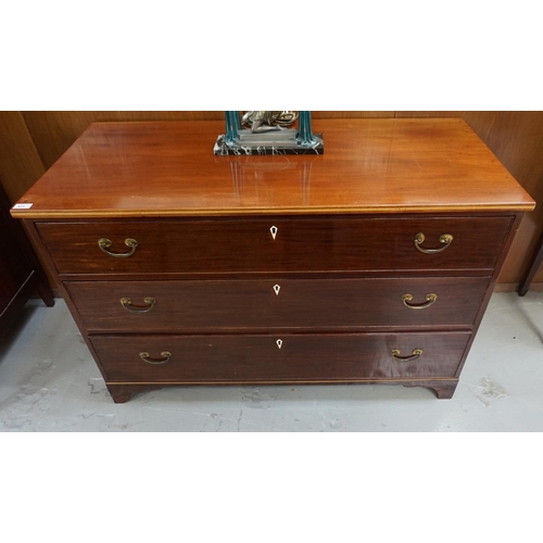 511 - 19TH CENTURY MAHOGANY CHEST
with a later moulded inlaid top above three long drawers with ivory escu... 