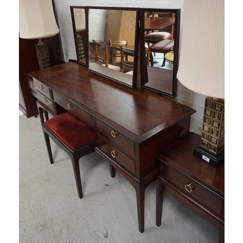 524 - STAG MAHOGANY BEDROOM SUITE
comprising a large triple door wardrobe 224cm x 174cm, a two door wardro... 