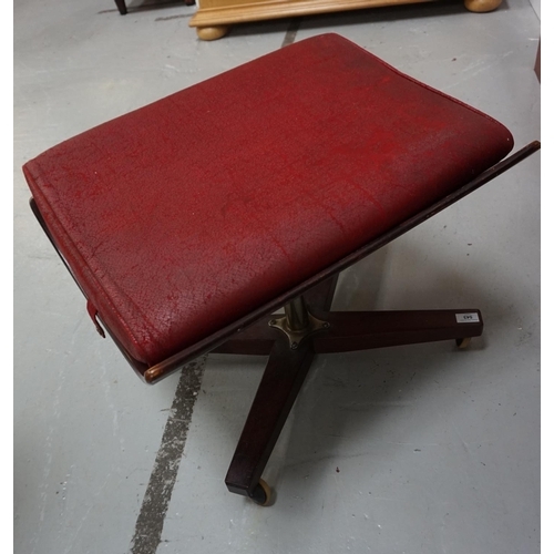 543 - RETRO 1960s SHAPED TEAK FOOTSTOOL
with removable fitted pad, raised on metal pedestal with quatrefoi... 