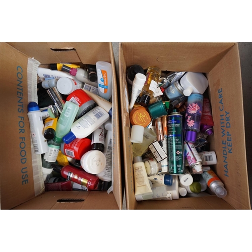 73 - TWO BOXES OF USED AND NEW TOILETRIES
including Iceberg, Christian Dior, NAils Inc, Calvin Klein, Ver... 