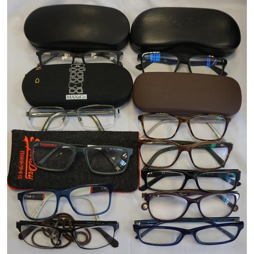 270 - ELEVEN PAIRS OF DESIGNER FRAME PRESCRIPTION SPECTACLES
Including: RAY-BAN; GUESS; CAROLINA HERRERA; ... 