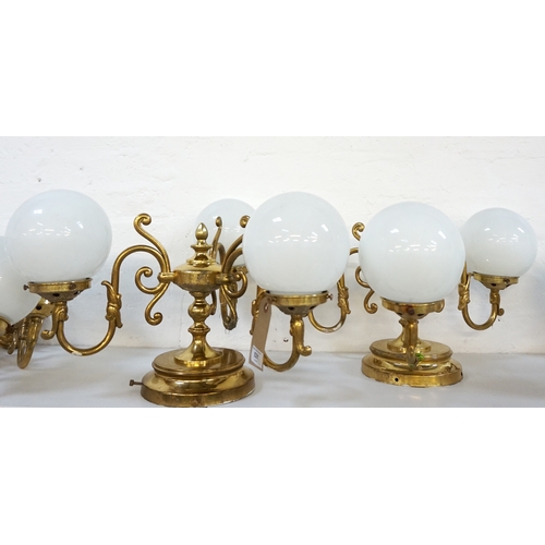 531 - PAIR OF GILT BRASS CEILING LIGHTS
each with three scroll arms and opaque circular glass shades - RE-... 