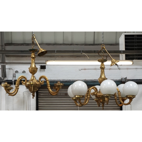 533 - PAIR OF GILT BRASS AND STEEL CEILING LIGHTS
each with six scroll arms around a decorative shaped cen... 