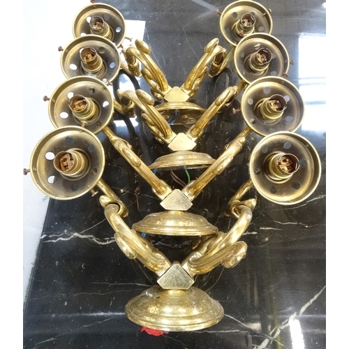 485 - SET OF FOUR GILT BRASS WALL LIGHTS
each with a pair of scroll arms and opaque circular glass shades