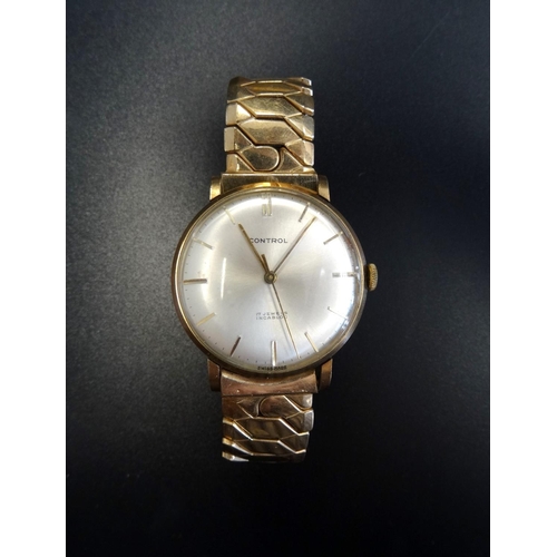 34 - 1960s GENTLEMAN'S 'CONTROL' NINE CARAT GOLD CASED WRISTWATCH
with expanding plated wristband