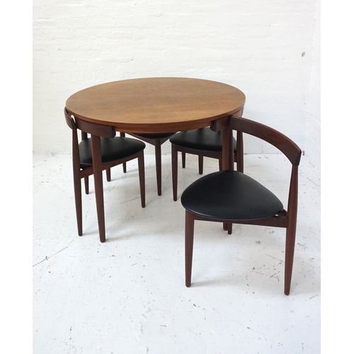 419 - CIRCULAR DANISH TEAK DINING TABLE AND CHAIR SUITE
designed by Fren Rojle for Hans Olsen, comprising ... 