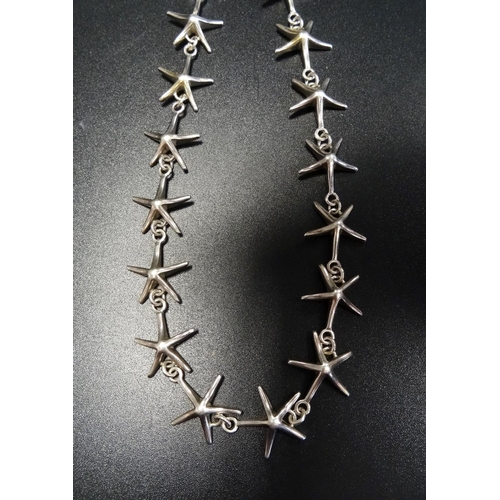13 - SILVER STARFISH DESIGN NECKLACE 
approximately 50cm long and 37.2 grams