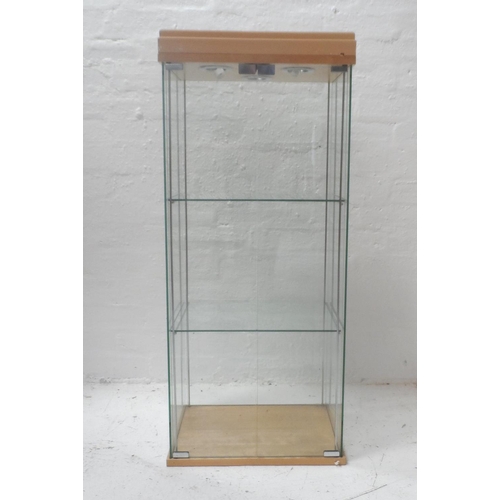 500 - ILLUMINATED GLASS DISPLAY CABINET
with double doors and two glass shelves, 109cm x 46.5cm x 36.5cm