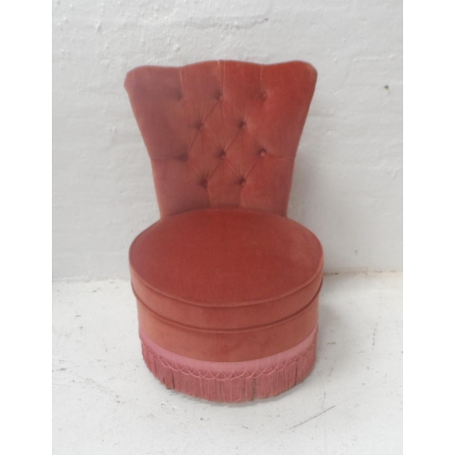 501 - PINK VELOUR BEDROOM CHAIR
with button back above a circular seat with fringe detail - RE-OFFERED IN ... 