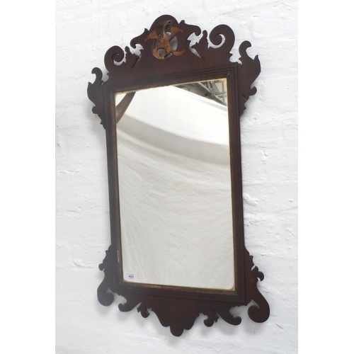 493 - GEORGE III STYLE MAHOGANY FRET CARVED WALL MIRROR
surmounted with a giltwood griffen, 88cm high, tog... 