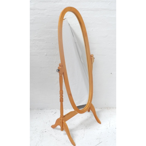 495 - OVAL BEECH CHEVAL MIRROR
supported by turned arms and standing on splayed supports, 155cm high