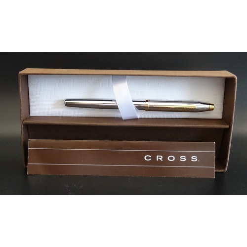 279 - CROSS CENTURY II FOUNTAIN PEN
with a two tone body of polished chrome and 23 carat gold plated highl... 