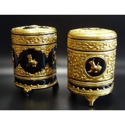 290 - TWO CHINESE LACQUERED CIRCULAR TEA CADDIES
of two section construction with lift off lids, decorated... 