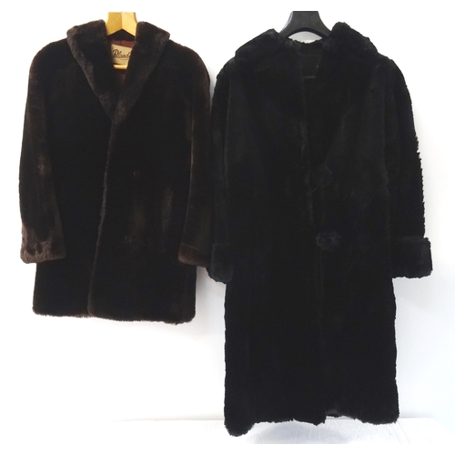 390 - LADIES CONEY FUR COAT
in black with elaborate detail to the lining, together with a 'Blandmore' arti... 