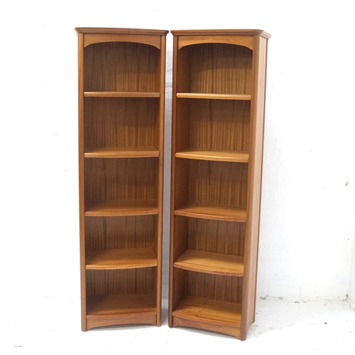 481 - PAIR OF NATHAN TEAK BOOKCASES
each with a moulded top above four shelves, 183.5cm x 54cm (2)