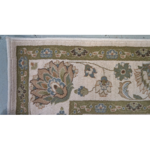 483 - GOOCH WOBURN WOOL RUG
the mushroom coloured ground decorated with floral motifs and encased by a dar... 